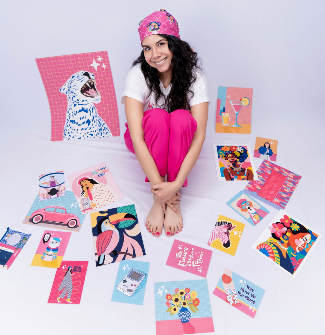 Picture shows digital artist Michelle Ruiz with her new collection of wall art decor. 