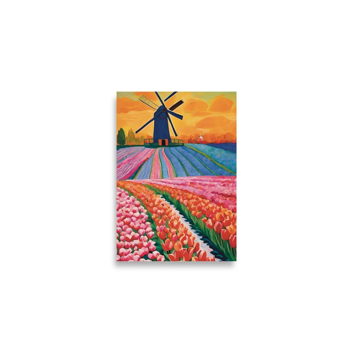 Don Quixote Field of Dreams Art Print depicts a field full of flowers in tones of orange pink, greens and blues with a windmill at the end in an afternoon sky. 